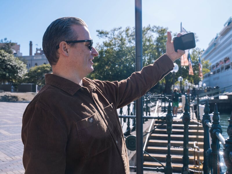 Man taking photo outside